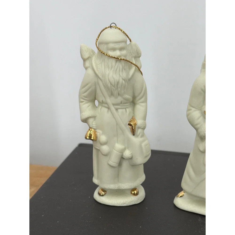 Set of 4 Vintage Bisque Porcelain Santa Claus Figurines Gold Accents Ornaments